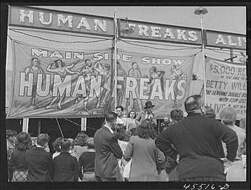 "Outside a freak show at the Rutland Fair in Vermont." Photograph by Jack Delano. From the Library of Congress Prints & Photographs Division Washington, DC.