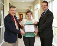 Receiving the Dean's Distinguished Essay Award for my article in Scientia and Humanitas